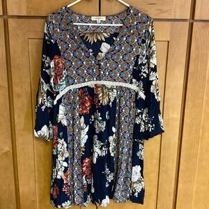 Umgee floral bohemian baby doll dress with bell sleeves and crochet details